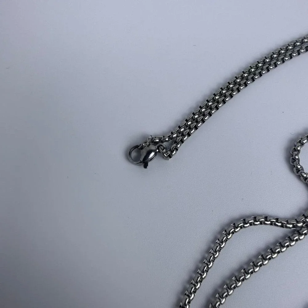 Silver cross pendant necklace